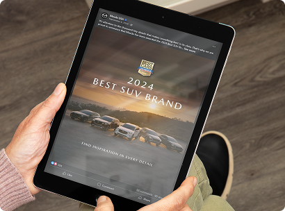 Mazda USA shows cars parked under a sunset with a U.S. News badge for “2024 Best SUV Brand” on Facebook.